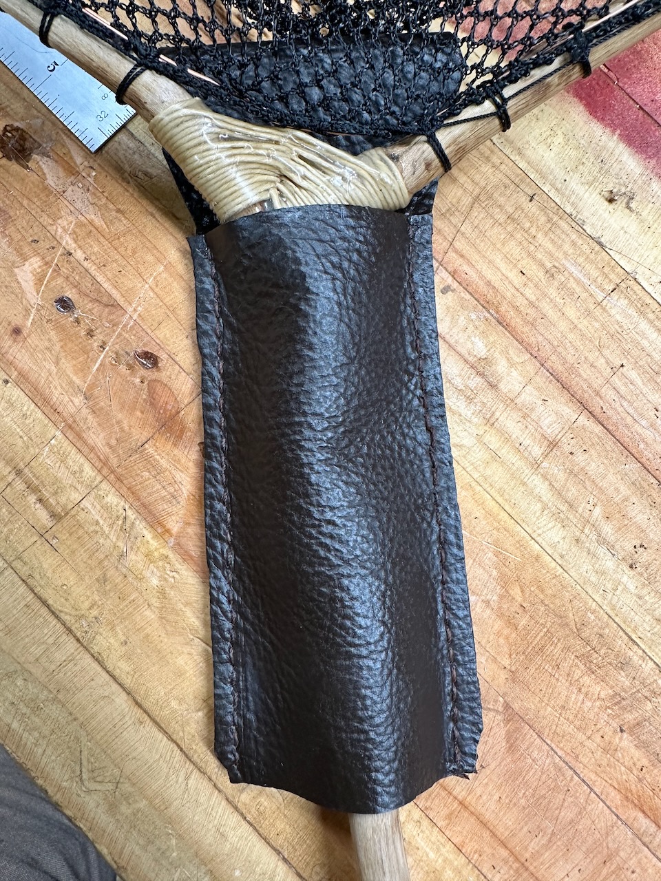 Leather holster for a landing net